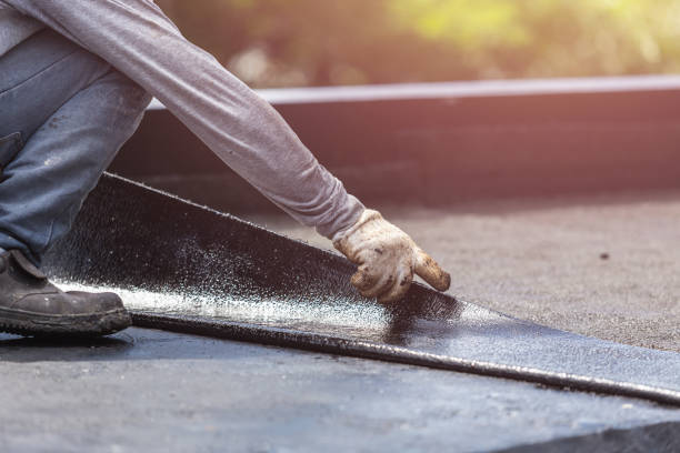 Professional Waterproofing technician working in Drayden, MD